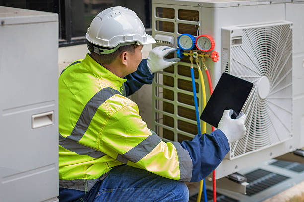 Professional Air Duct Cleaning technician working in Marine City, MI